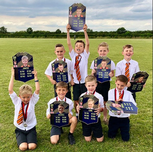 Close-up of a personalised end of season football player award card showing photo, name and stats