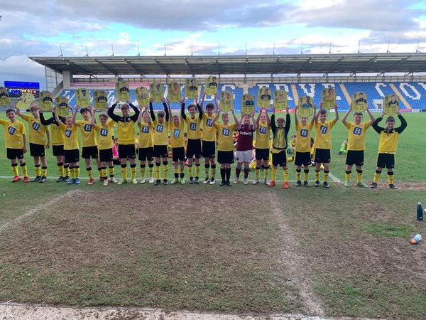 Full squad of personalised end of season football player award cards laid out together
